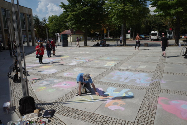 The chalk drawings are getting more and more_